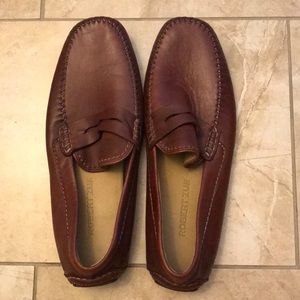 Men’s brown leather loafers.